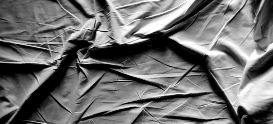 How do you keep your bed sheets from wrinkling?